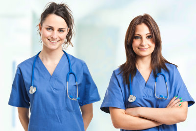 nurses in a clinic smiling